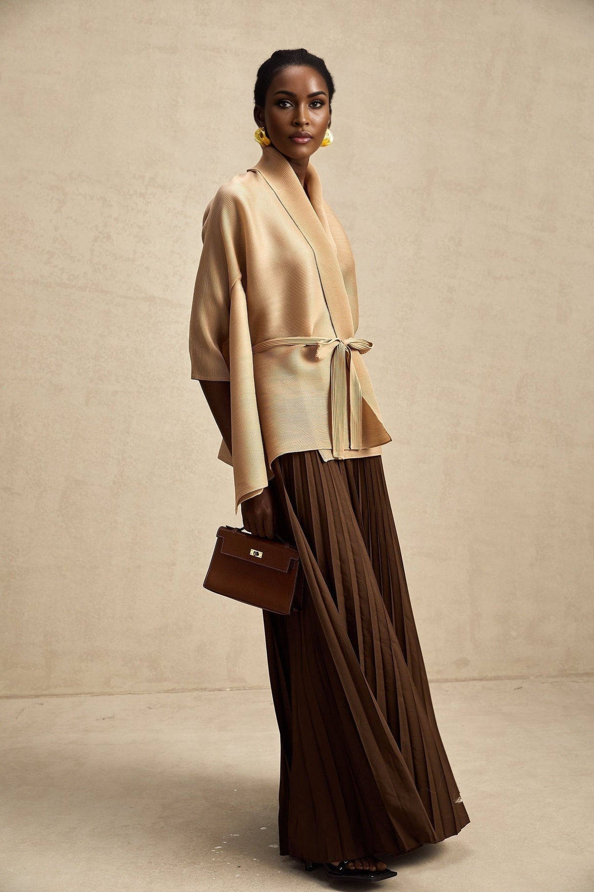 Adèle capedesign pleated top  skirt matching set