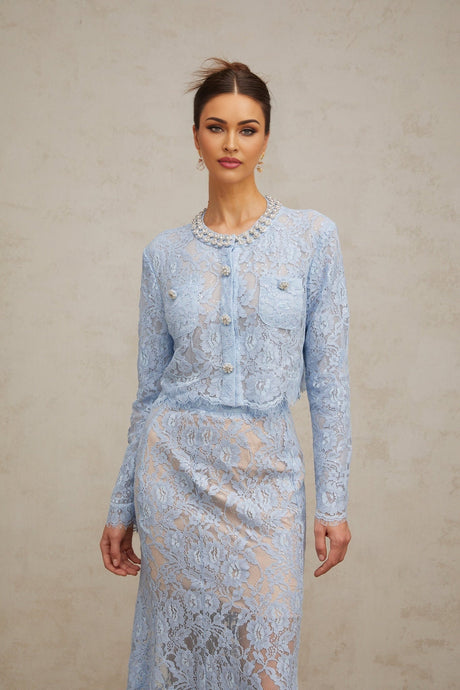 Ariane matching set with blue floral lace top and skirt on white background