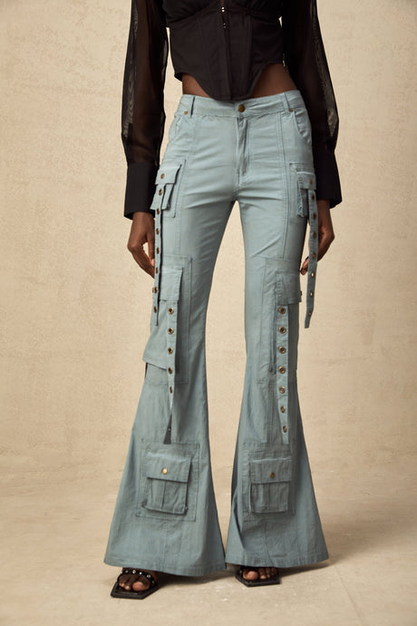 Beige flared cargo trousers with belt loops and multiple pockets on the legs
