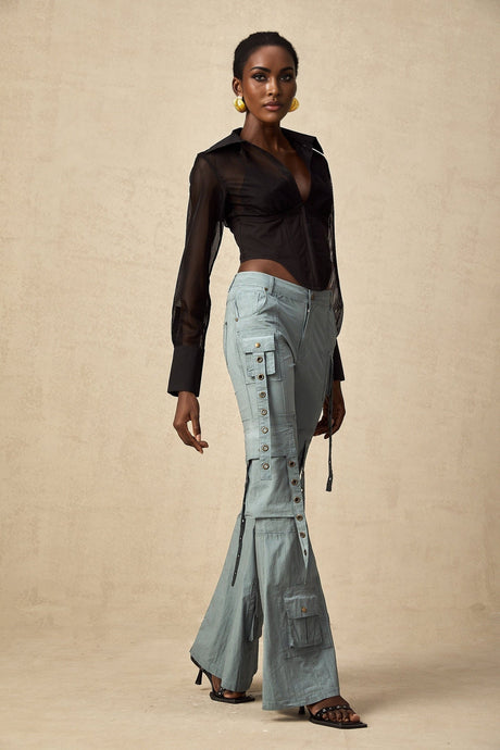 Beige flared cargo trousers with belt loops and multiple pockets on the legs