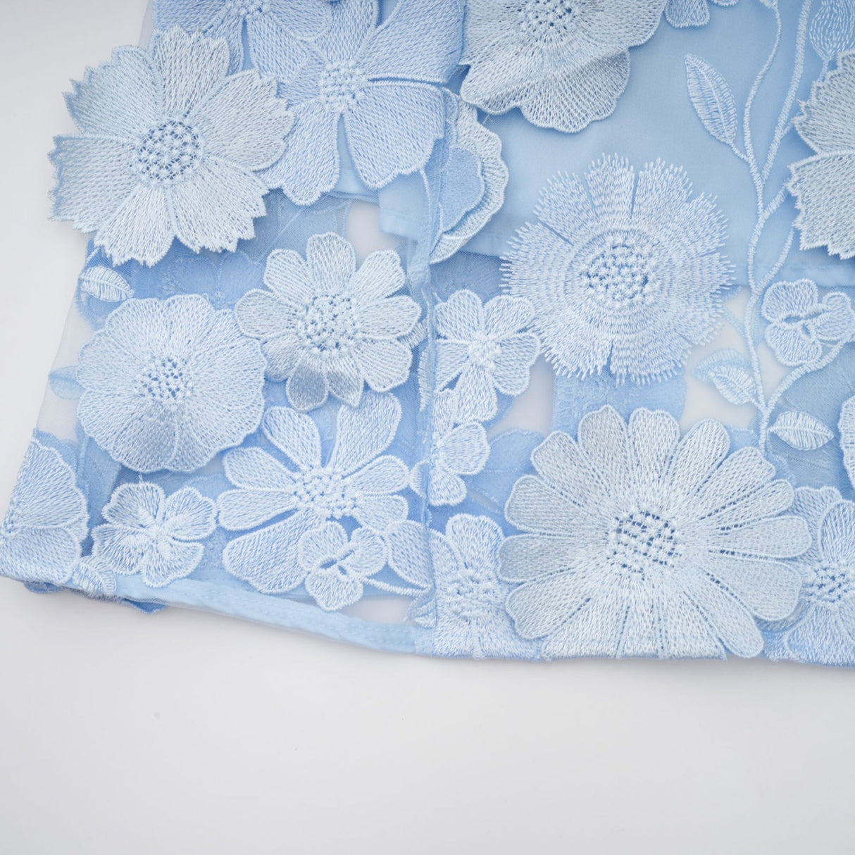 Blue midi dress with floral applique details by Herta