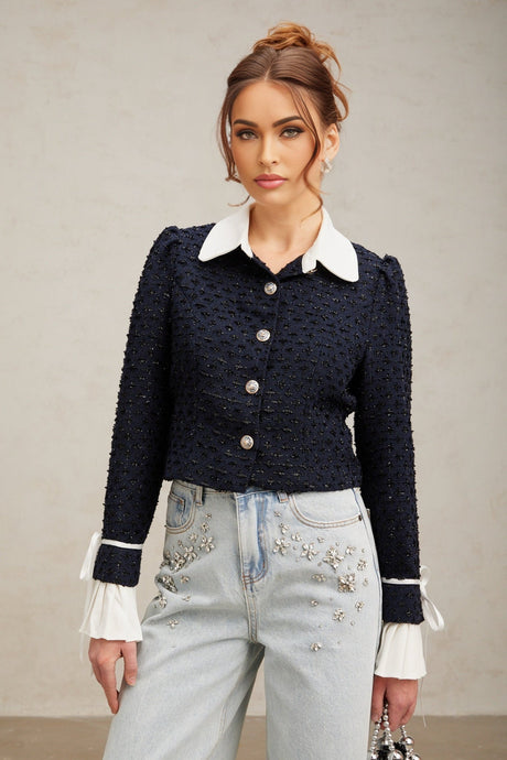 Doriane navy blue jacket with tweed panels and a structured silhouette