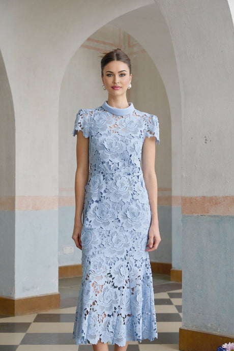 Elegant blue midi dress with delicate floral lace applique details and feminine silhouette