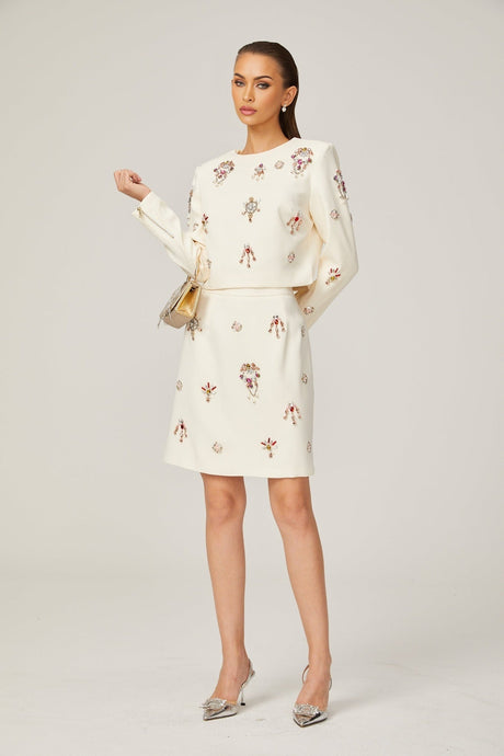 Jeanne white crystalembellished top  skirt matching set