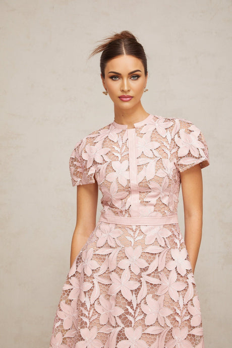 Pink lace midi dress with guipure pattern and delicate details