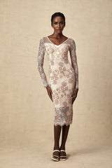White formfitting midi dress with intricate guipure lace pattern throughout featuring short sleeves and scalloped hem