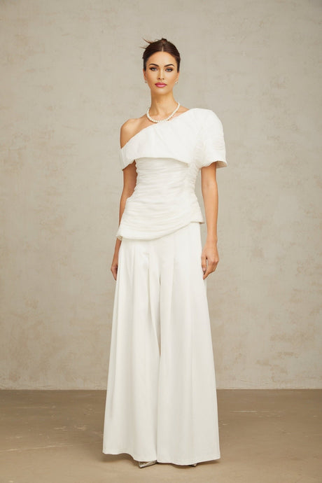White matching set featuring Adele creased top and trousers