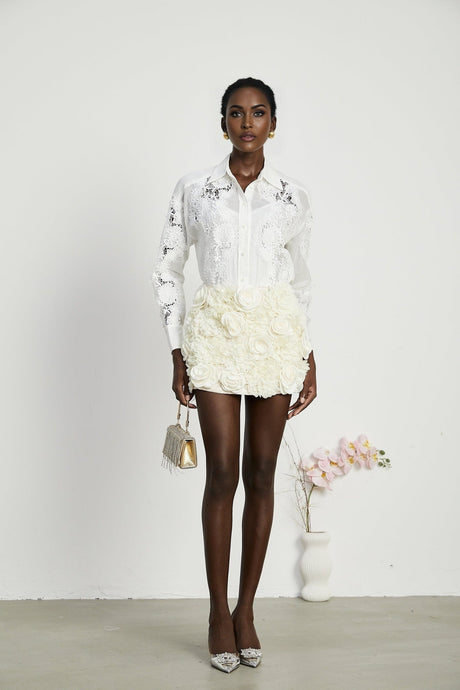 White shirt with lace embroidery details and cut out sections